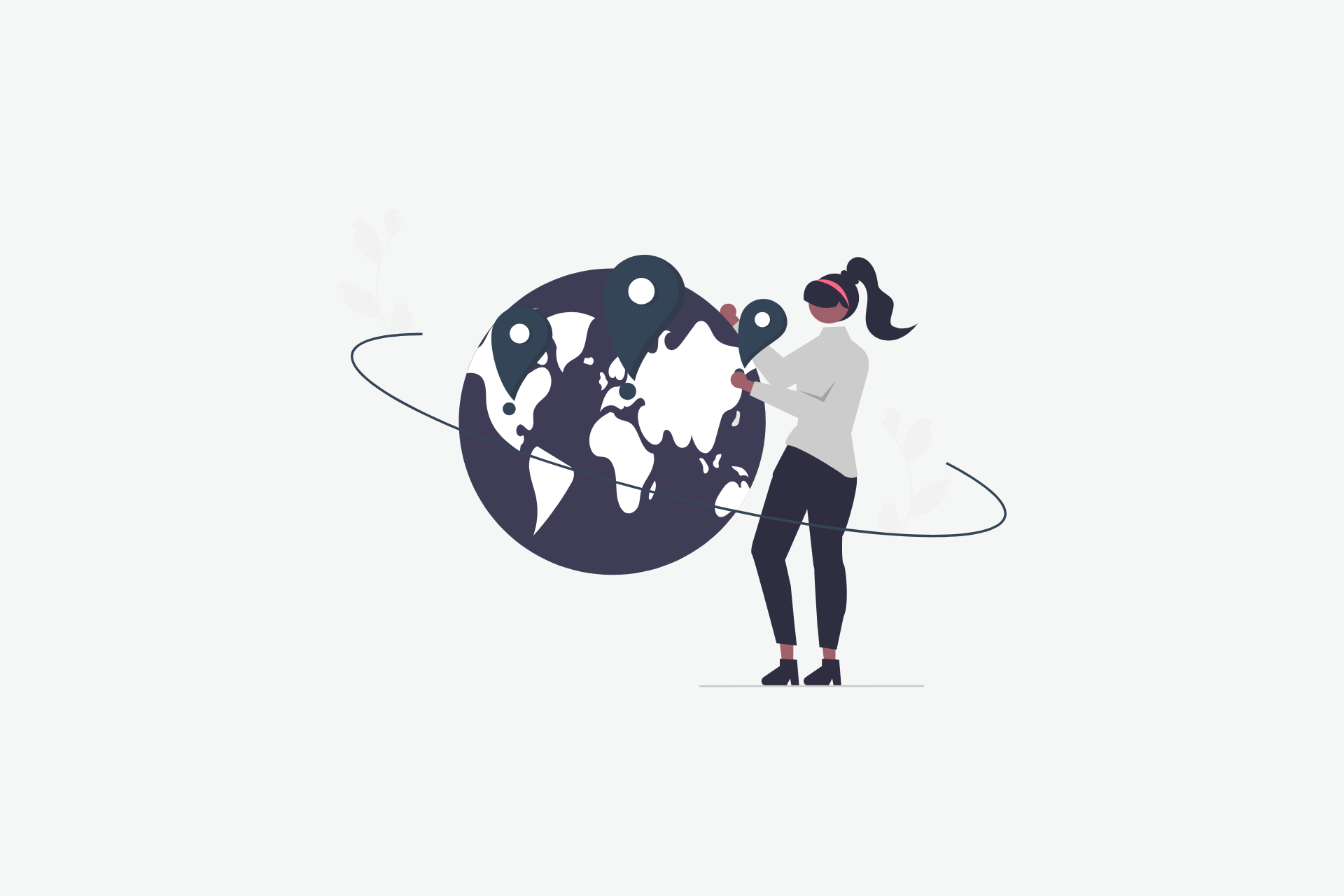 A woman stood looking at a globe with location marks on