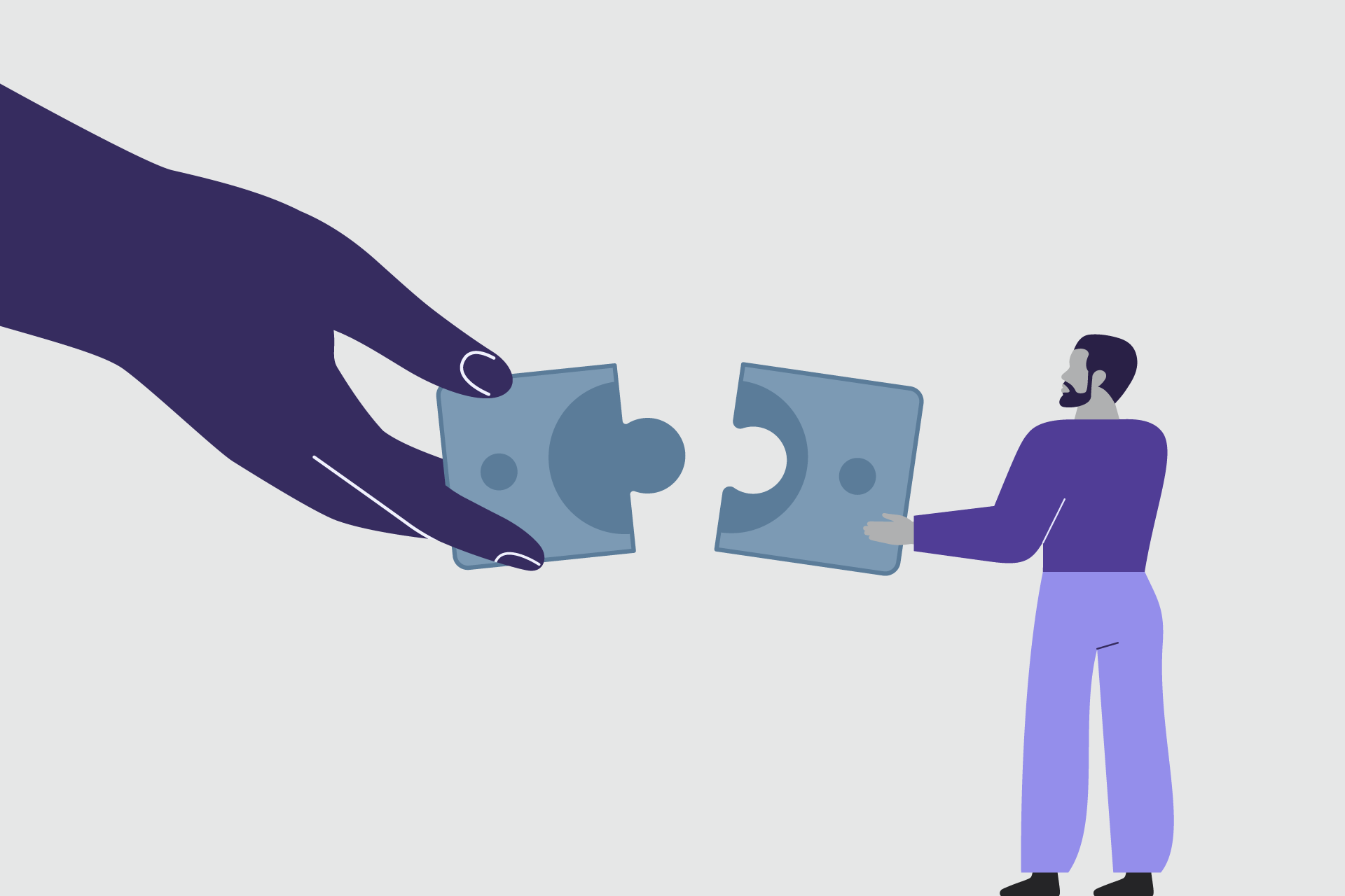 Hands fitting puzzle pieces together, representing integrated higher education solutions